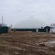 Digester installed by DLS Biogas with heat and power production units and the DLS technical container pictured