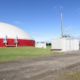 Digester installed by DLS Biogas with the containers containing the heat and power production pictured